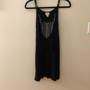 Black dress with white detailing in the front